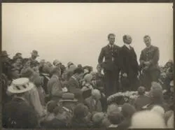 [Charles Ulm, Charles Kingsford Smith and unidentified man surrounded by crowd, Wanganui, New Zealand, 1928?]