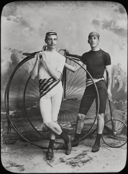 J. E. Fenlon and E. Mayes with penny-farthings