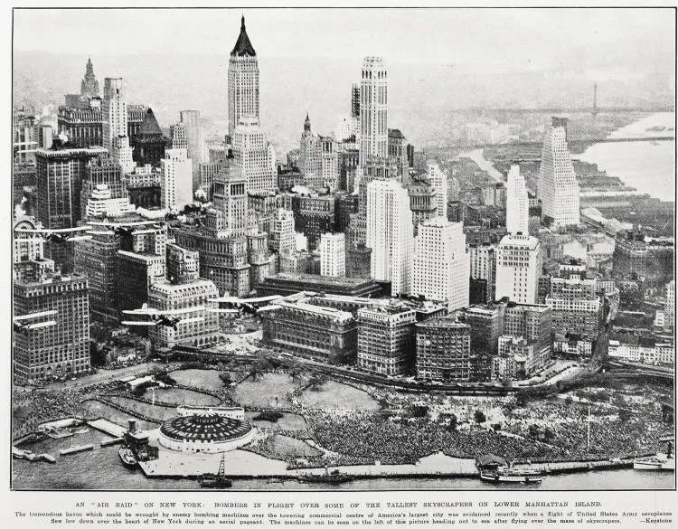 An ' air raid ' on New York: bombers in flight over some of the tallest skyscrapers on lower Manhattan Island
