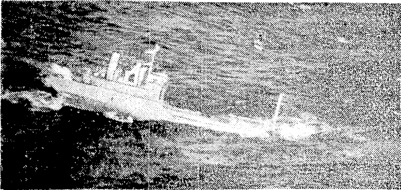 A Japanese tanker goes under after being bombed by planes from 'Vice-Admiral John S. McCains fast carrier task force off the French Indo-Cldna coast. (Evening Post, 03 March 1945)
