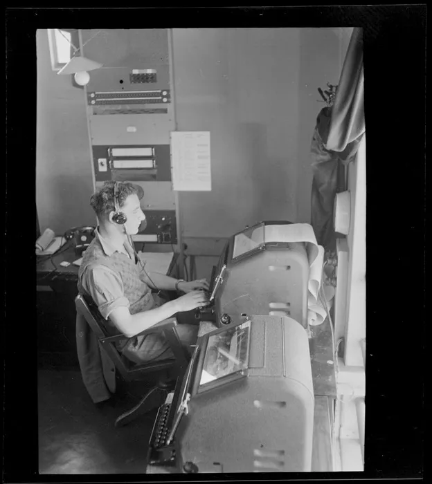 Telegraph Operator B V Richards, sending a telegraph, Musick Point Air Radio Station, Howick, Auckland