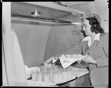 Image: Eliaine Kuss (Air hostess) on board Pan American World Airways (PAWA) probably Clipper Red Rover