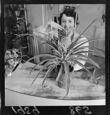 Image: Robyn A'Court with a locally grown pineapple