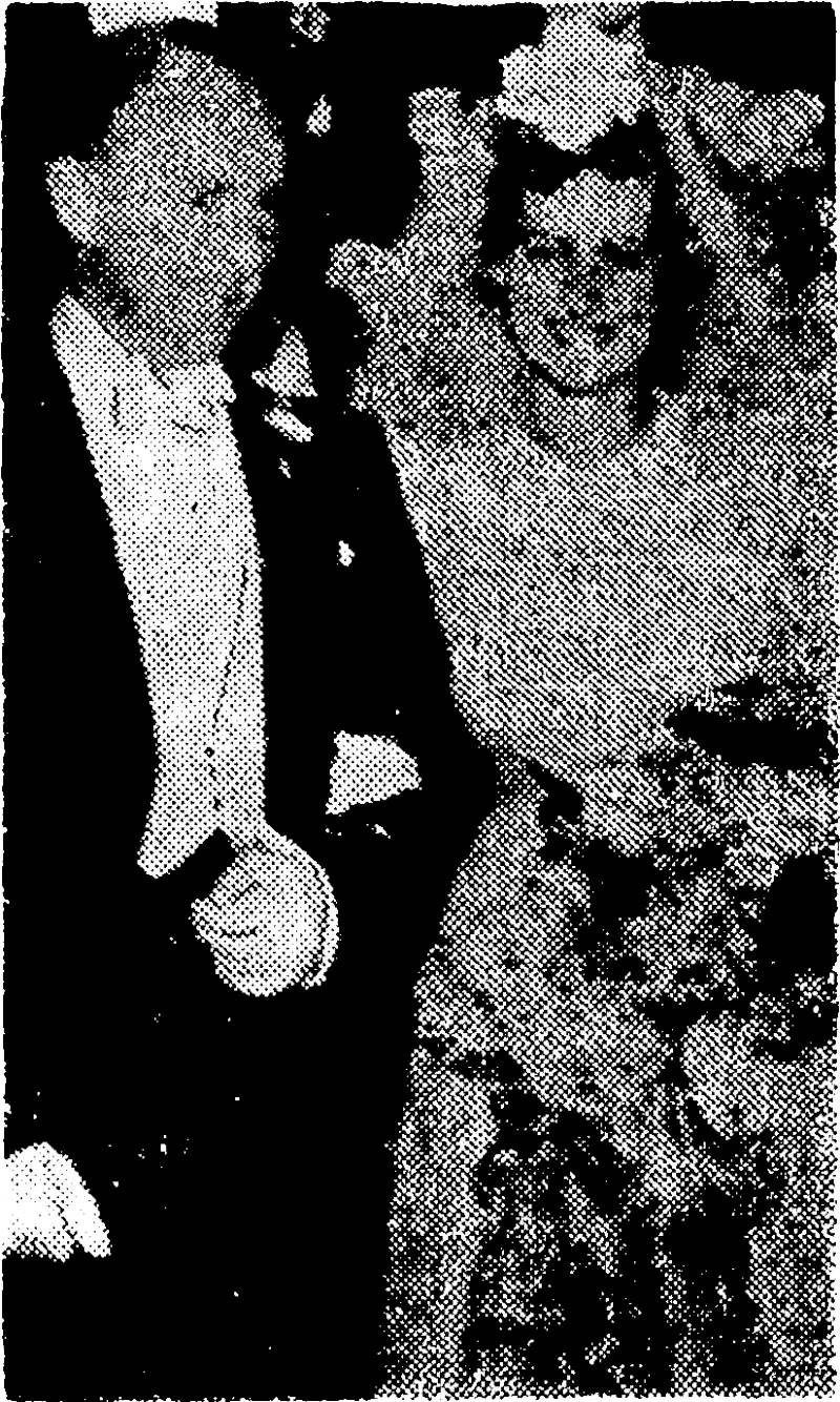 Flight Lieutenant K. Brownjohn, a ivcll-known Wellington air pilot, and his bride, Miss Mignonne Lock, of Auckland, after their marriage at St. Mary's Cathedral, Auckland, on Saturday. Flight Lieutenant Brownjohn was for a number of years a Wellington Aero Club pilot and afterwards a commander in Union Airways until the outbreak of war. Now he is one of the flying personnel of Tasman Empire Airways. (Evening Post, 19 March 1941)