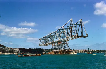 Image: Moving the pick-a-back section of the Auckland Harbour Bridge into place, 1958