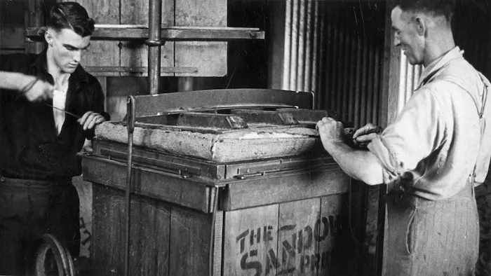 Sewing up a bale in a wool press