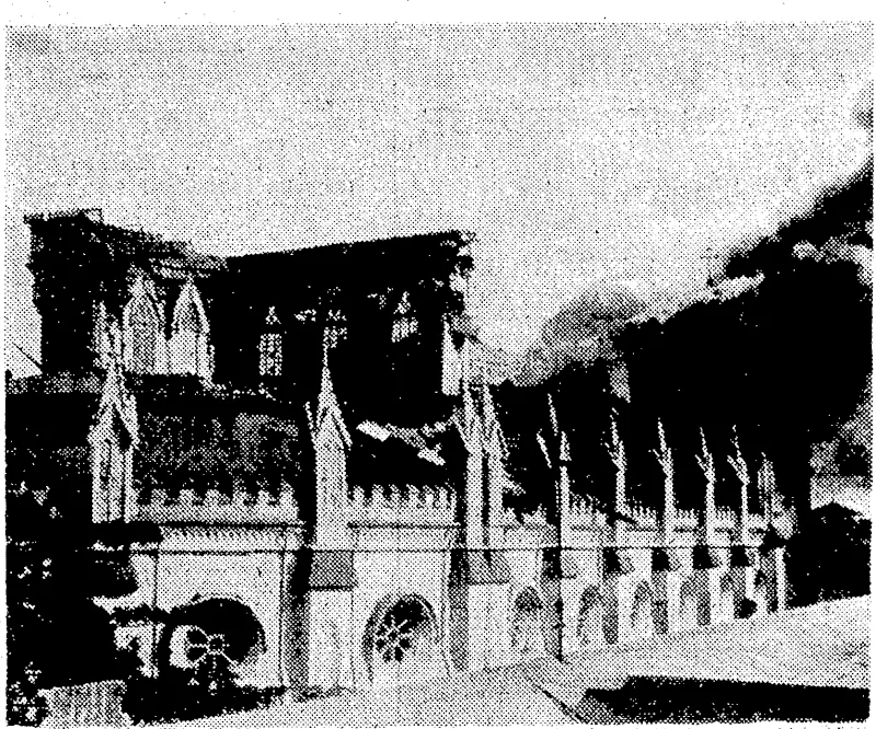 The historic <Santo Domingo Church, famous, shrine in Manila, burning after a Japanese bombing attack, which look place after the city had been evacuated and declared "open." '■ (Evening Post, 27 May 1942)