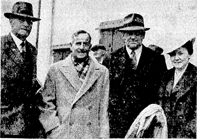 Amongst ex-Japanese prisoners of ivar who have returned to New Zealand in recent weeks arc Mr. and Mrs. R. H. Wild, ivho arrived by the Wahinc. Mr. Wild, who was formerly a resident of Wellington, urns manager of the Hong Kong branch of the South British Insurance Company, and ivus imprisoned near Hong Kong, whilst Mrs. Wild was detained at Manila. They were welcomed on arrival at Wellington by Mr. S. S. Dean (between Mr. and Mrs. Wild), local manager of the company, and Mr. H. J. Murdoch (left), the company's inspector. (Evening Post, 22 November 1945)