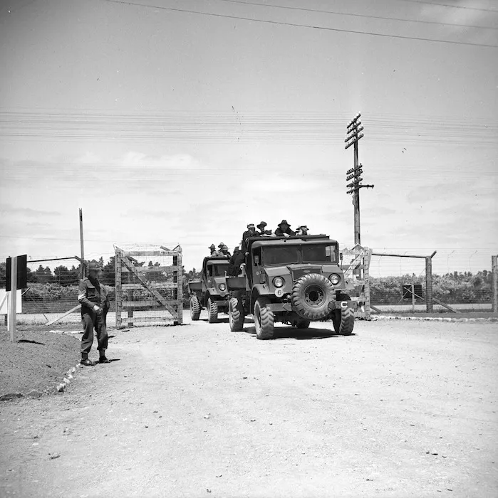 Japanese prisoners of war being transported back to camp after a days work