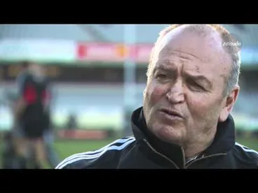 Image: Graham Henry, the All Blacks and their biggest fan!