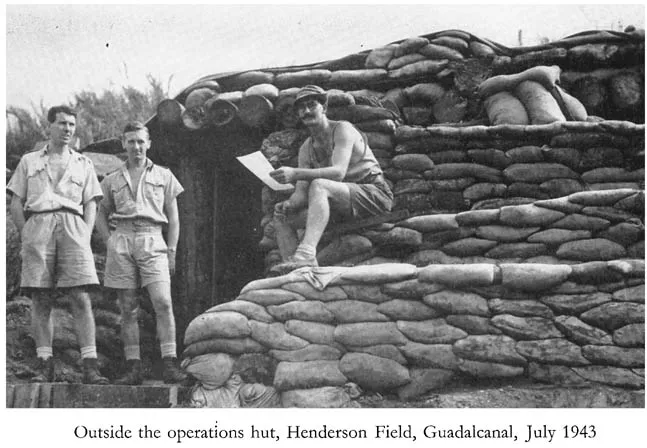 Outside the operations hut, Henderson Field, Guadalcanal, July 1943