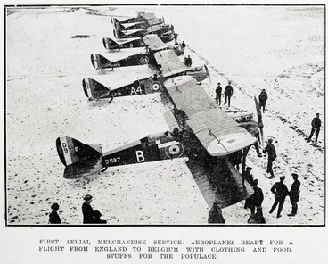Image: First aerial merchandise service: aeroplanes ready for a flight from England to Belgium with clothing and food stuffs for the populace