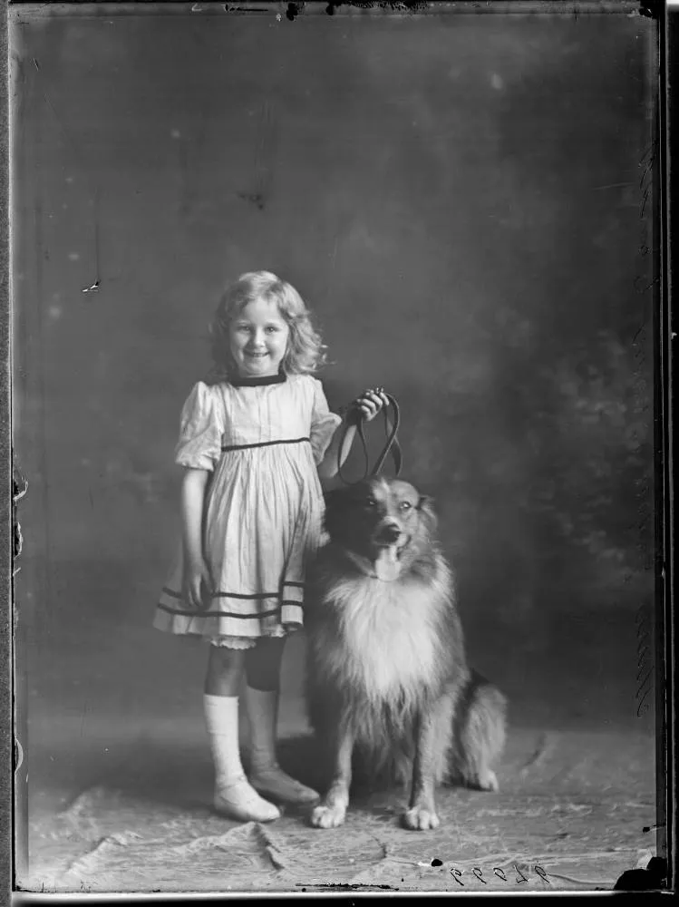 Missie Jasper Brown and dog, 1911