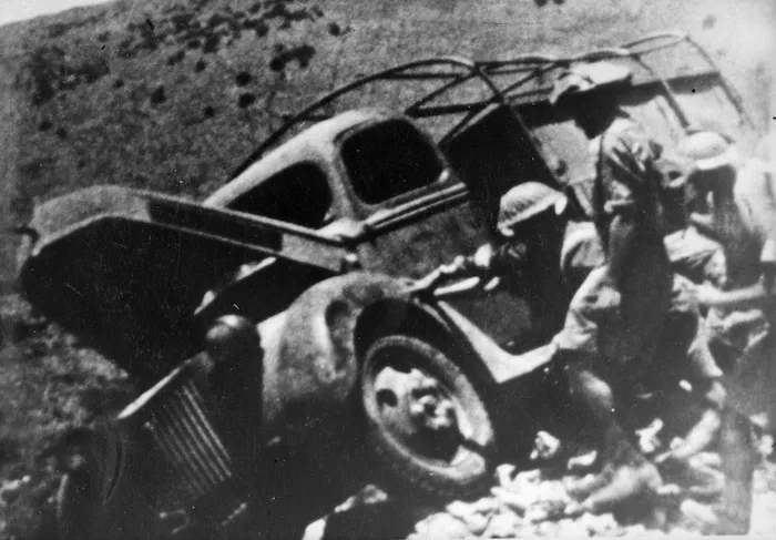 Pushing a truck over a bank on the retreat to Spahkia