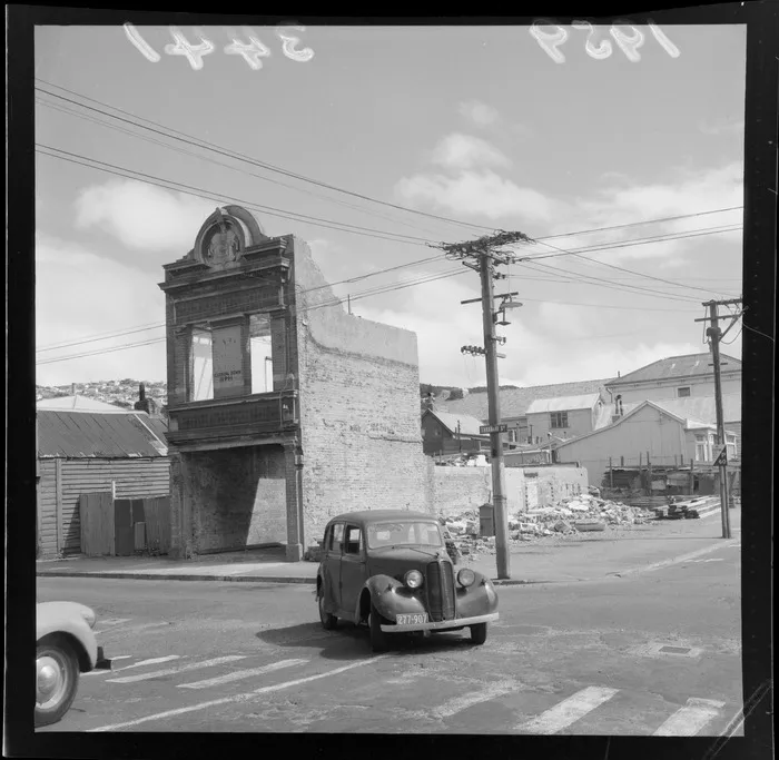 Demolition of a building built in 1863, upper Taranaki Street, Wellington City