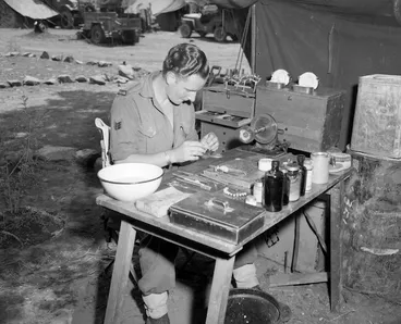 Image: [Sgt M C Cottle repairing dentures in the field, Korea]