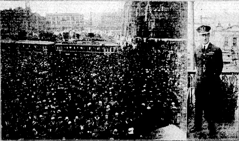 Captain Kingsford Smith (on the right) on the balcony of the United Servioe Hotel, Cathedral *«««, Chrbtefcurtb, where he acknowfeiifed the cheers of the crowd which had collected in the square below to do htm fcoMt^i (Evening Post, 12 September 1928)