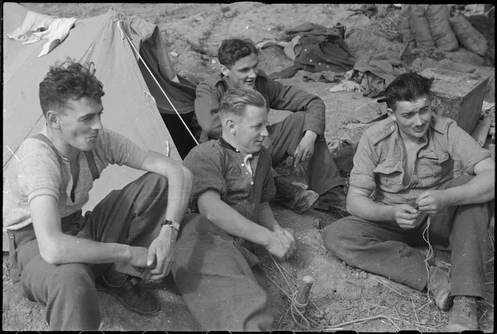 NZ Infantry soldiers rest immediately behind the line after the recent heavy fighting for Cassino, Italy, World War II - Photograph taken by George Kaye