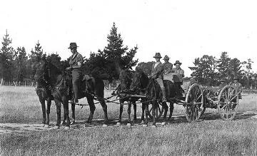 Group of soldiers with horse-drawn vehicle