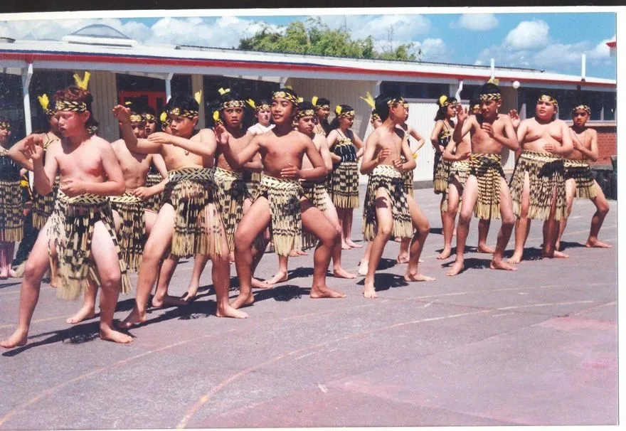 Taitoko Cultural Group performing, with boys at the front