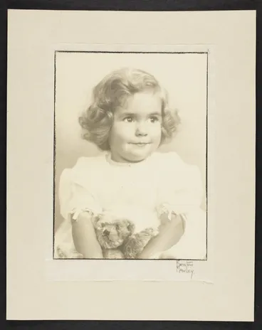 Image: Vida Mary Stout holding a teddy bear