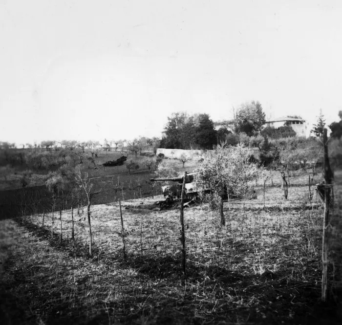 Military tank in a field, during World War II, Italy