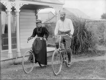 Image: Two unidentified members of the Curtis family on bicycles