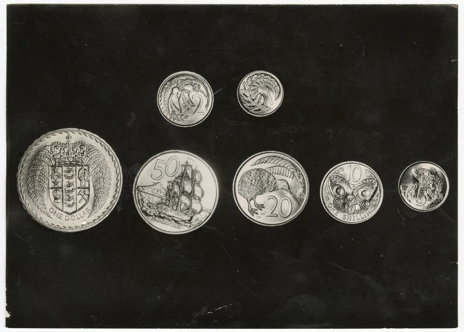 Seven coins photographed at the royal mint