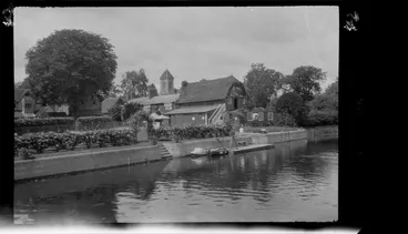 Image: Houses and unidentified village beside the River Thames, Buckinghamshire, England