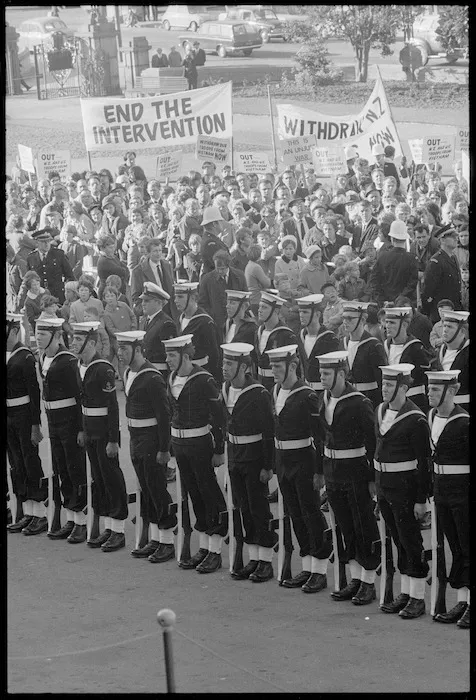 Sailors from the HMNZS Taranaki, and anti Vietnam war protesters, at the opening of Parliament in Wellington