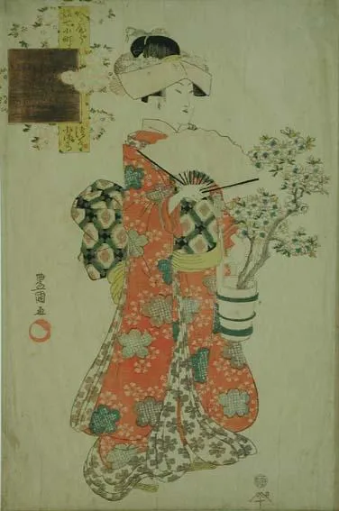 Woman with a fan and shrub in bucket