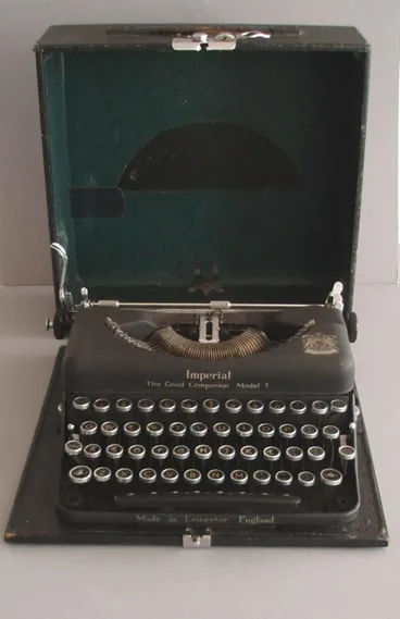Image: Portable typewriter and case