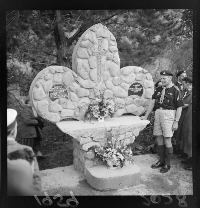 Unidentified scout leader with a memorial dedicated to Mary Crowther, Moore's Valley, Wainuiomata