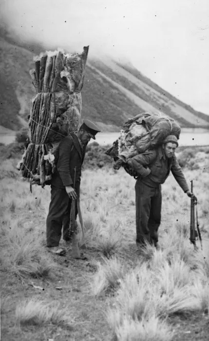 Men carrying deer skins