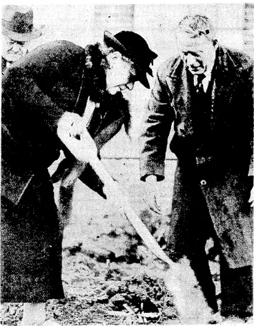 Image: Evening Post" Photo. Mrs. Knox Gilmer, president of the Wellington Horticultural Society, planting a tree at yesterday's Arbor Day function at Mount Cook School. Mr. J. G. MacKenzie, Director of Parks and Reserves, is superintending the proceeding. (Evening Post, 03 August 1939)