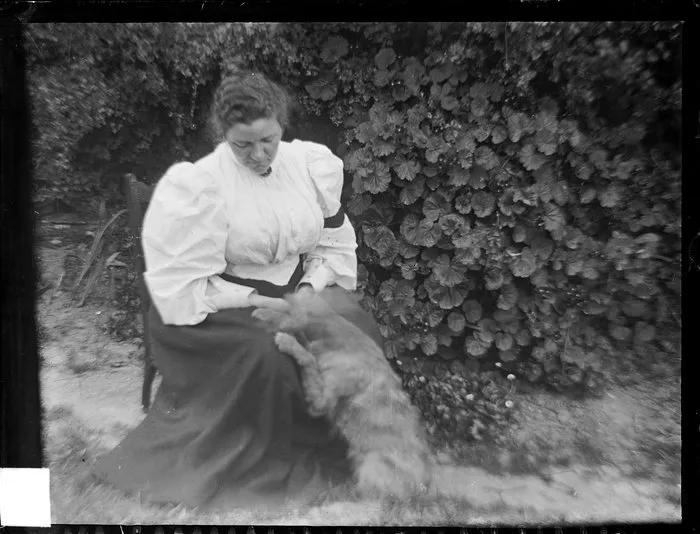 Lily Kirk and dog in garden