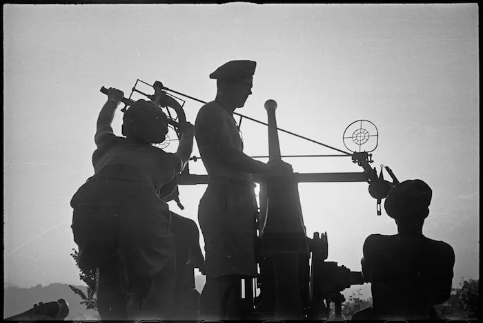 New Zealand anti aircraft gun and crew photographed at dusk near Sora, Italy, World War II - Photograph taken by George Kaye