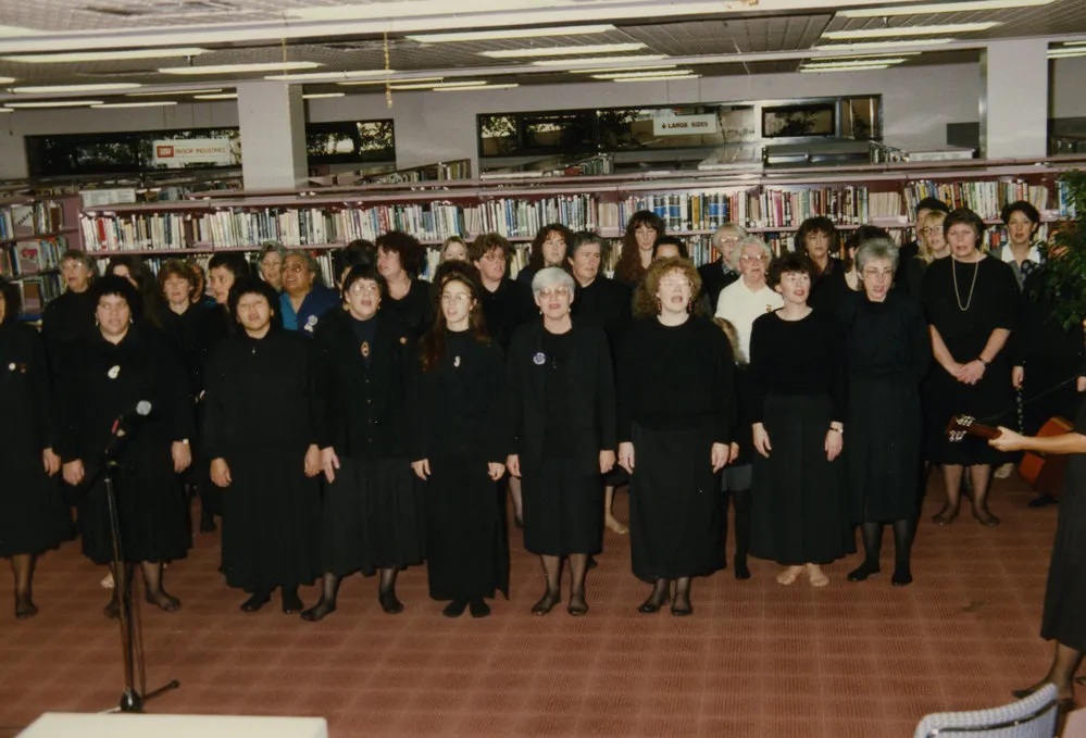 Group of women singing a waiata at Tauranga Library Tukutuku Panels Blessing 1993