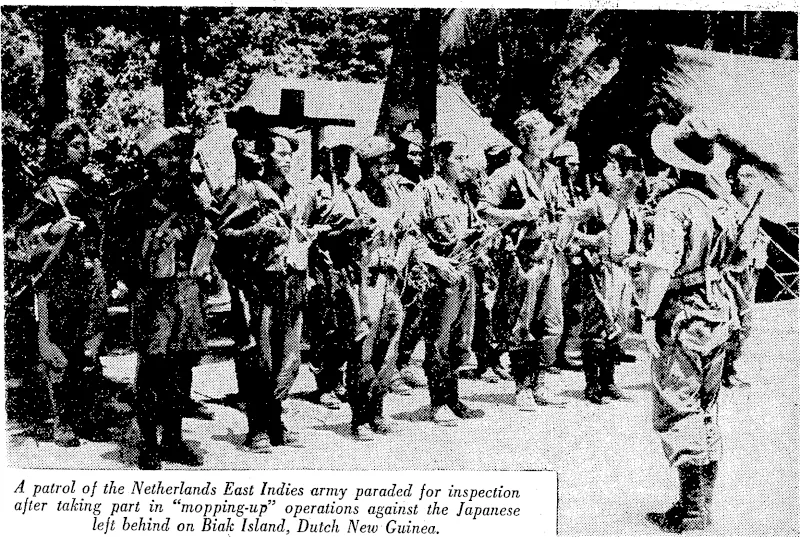 in ■" ._. „,„„„.. , ..„ .„ _ A patrol of the Netherlands East Indies army paraded for inspection after taking part in "mopping-up" operations against the Japanese left behind on Biak Island, Dutch New Guinea. (Evening Post, 12 April 1945)