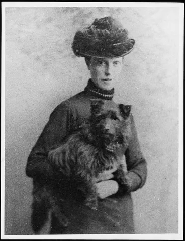 Image: Portrait of Grace Neill holding a dog