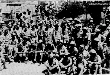 Image: New Zealanders serving with an Air Task Force in the Pacific under the command of Group Captain G. N. Roberts,' A.F.C. They are members of a Corsair servicing unit which 'is hitting the Japs hard on Bougainville. The men are shown enjoying a cup of tea provided' by the V.M.C.A. after, their arrival from Guadalcanal in response to a call for increased activity. (Evening Post, 03 May 1945)