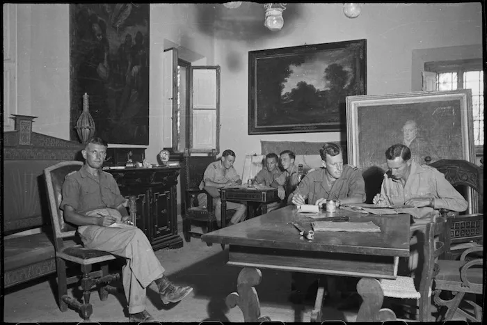 Members of 23 NZ Battalion in building used as headquarters during their advance to Florence, Italy, World War II - Photograph taken by George Kaye