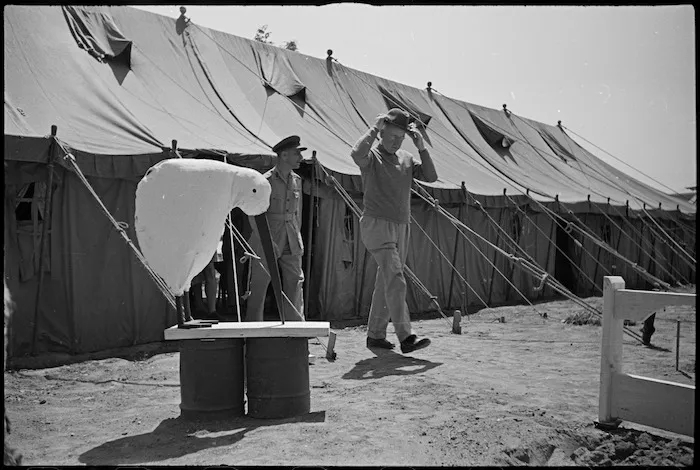 Prime Minister Peter Fraser passes the Kiwi at 2 New Zealand General Hospital, Caserta, Italy, World War II - Photograph taken by George Kaye