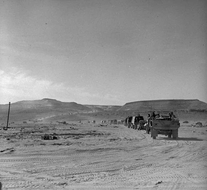 Army vehicles travelling in the desert on the Halfaya Pass, Egypt
