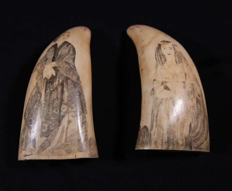 Scrimshaw whale teeth