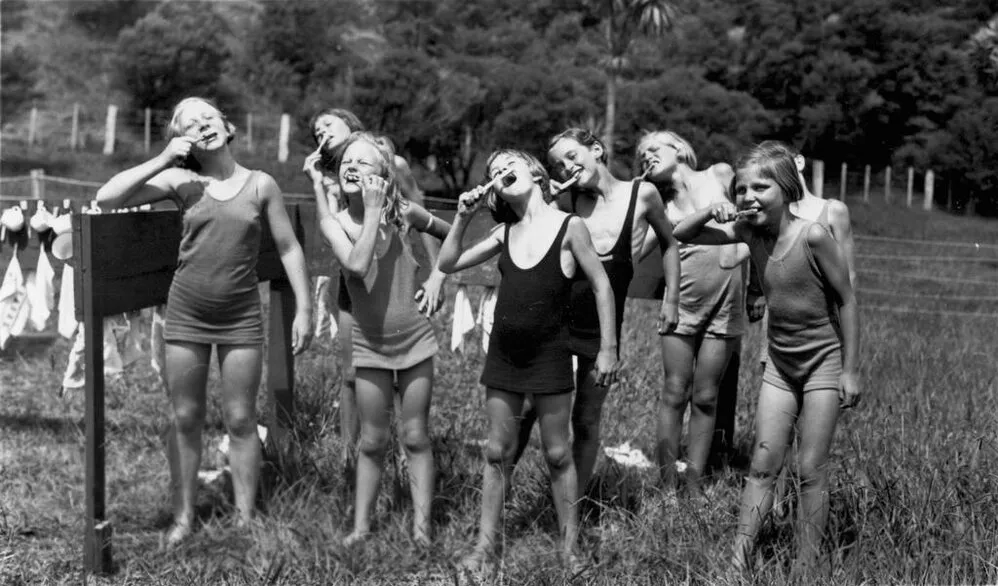 Girls brushing teeth at Health Camp