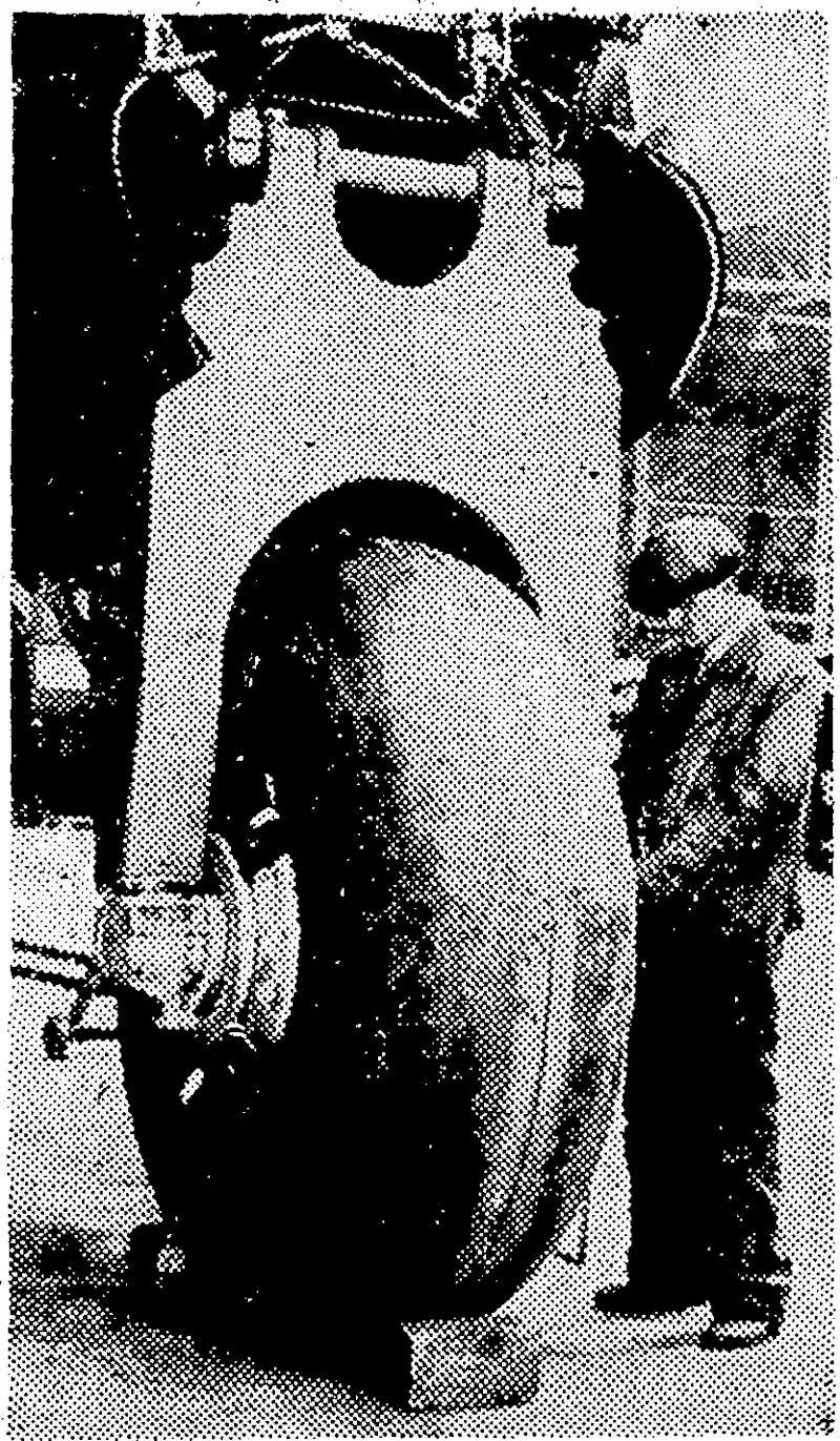 This. landing wheel o) a Halifax gives some idea of the immense size of the British bombers which are now being.used against Japan. (Evening Post, 16 June 1945)