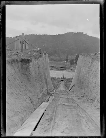 Image: Looking down a steeply sloping timber tram track towards river, Kakahi, Manawatu-Whanganui region