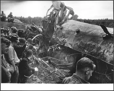 Image: Men on the banks of the Whangaehu Stream at the scene of the railway disaster at Tangiwai