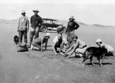 Image: Douglas family on holiday up north: Digging for Toheroas